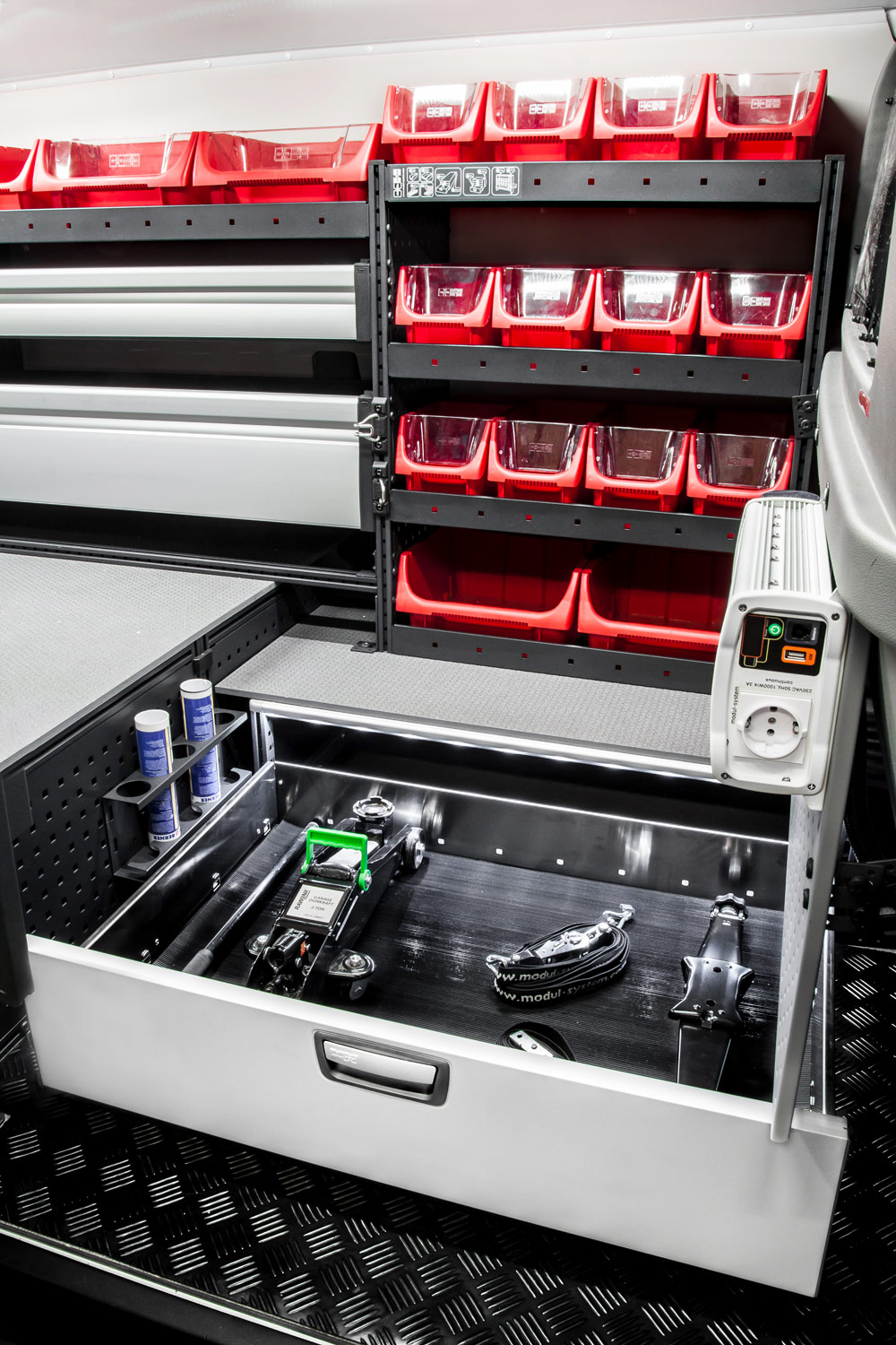 Example of modul-system drawer open with tools and storage boxes